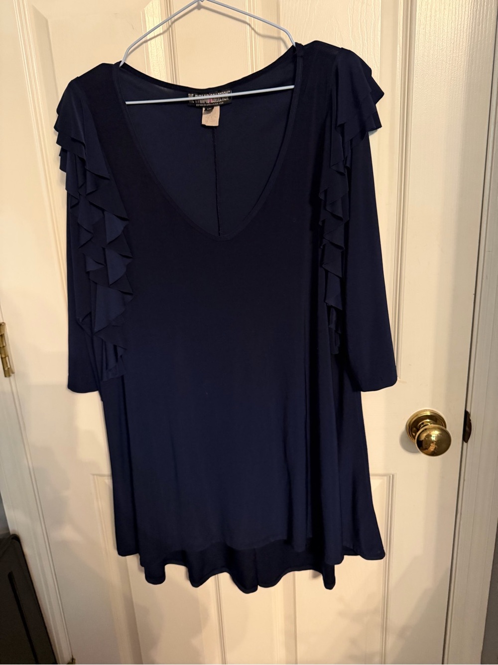 The Pyramid Collection Navy V-Neck Tunic with Ruffle Sleeves, size 1X.